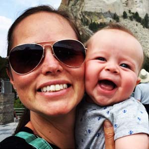 photo of a woman and baby