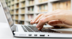 typing on the laptop