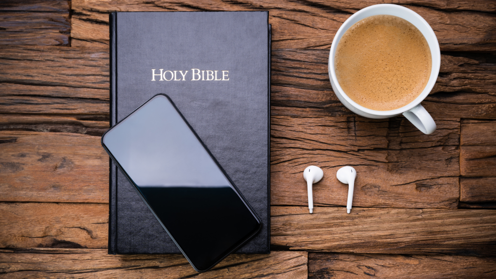 Phone on Top of the Bible with Coffee