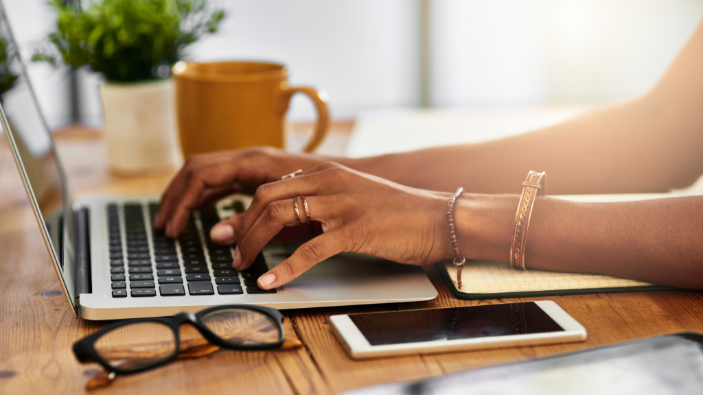 hands on laptop typing