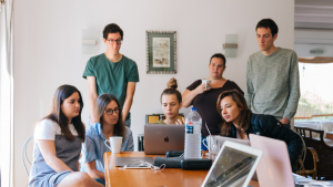 Group of People Watching on Laptop