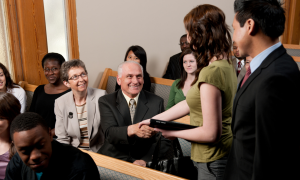 woman hand shaking with an old man