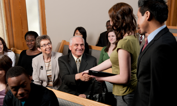 woman hand shaking with an old man
