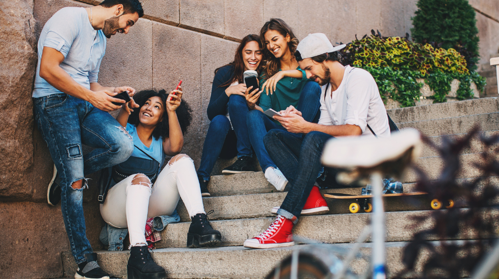 Gathering of young people with mobile phones