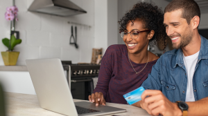 Happy Couple Making Online Payment